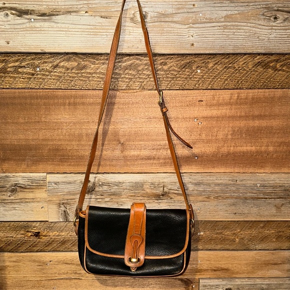 Dooney & Bourke All Leather Black & Tan Leather Equestrian Crossbody Bag - Picture 1 of 15